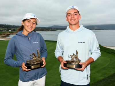 Naomi Raymundo and Charlie Haney pose with their trophies